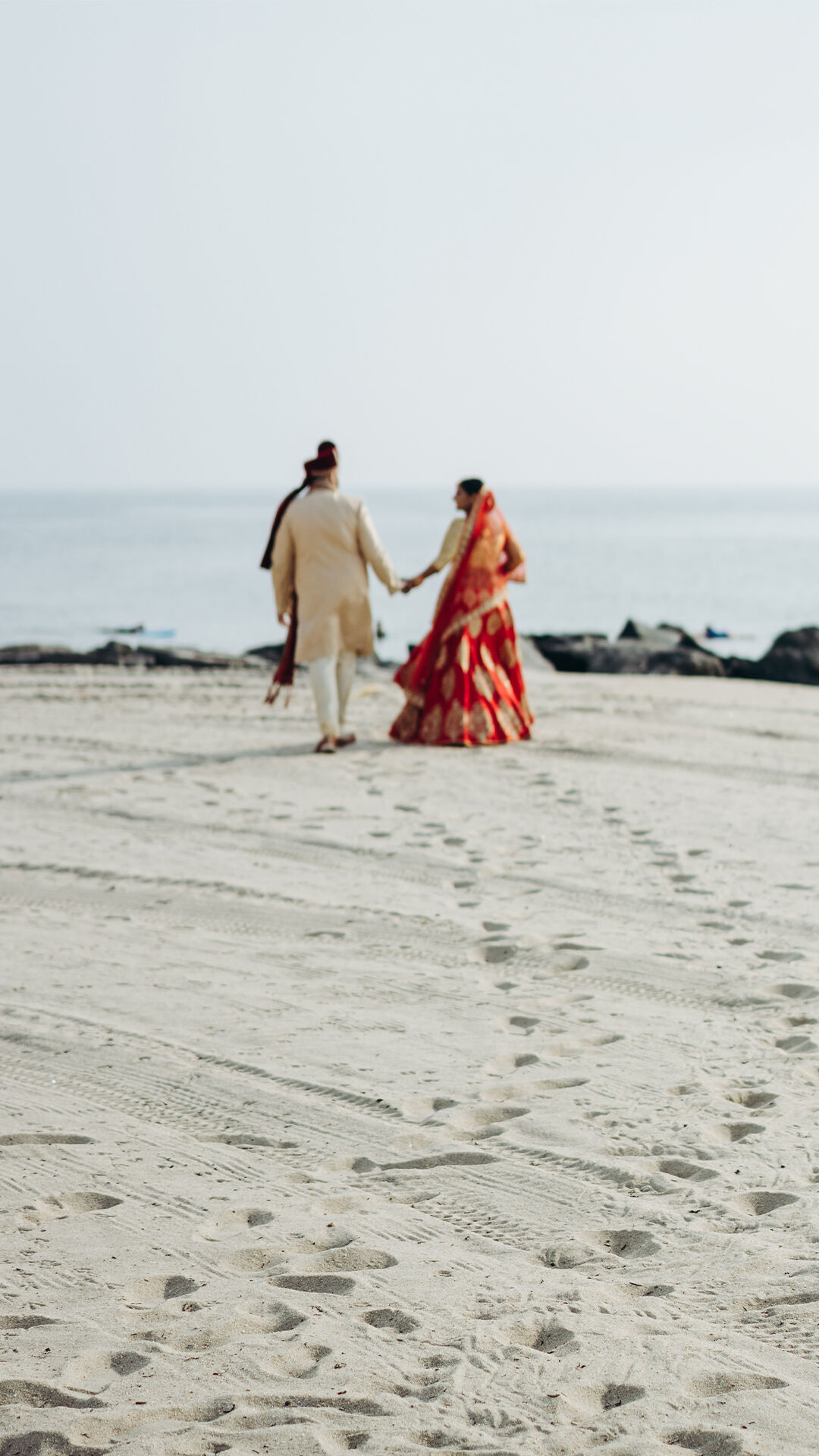 A bride and groom on beach destination for their wedding 